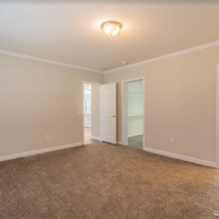 Bedroom in 2010 model home by Monroe County Mobile Homes