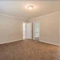 Bedroom in 2010 model home by Monroe County Mobile Homes